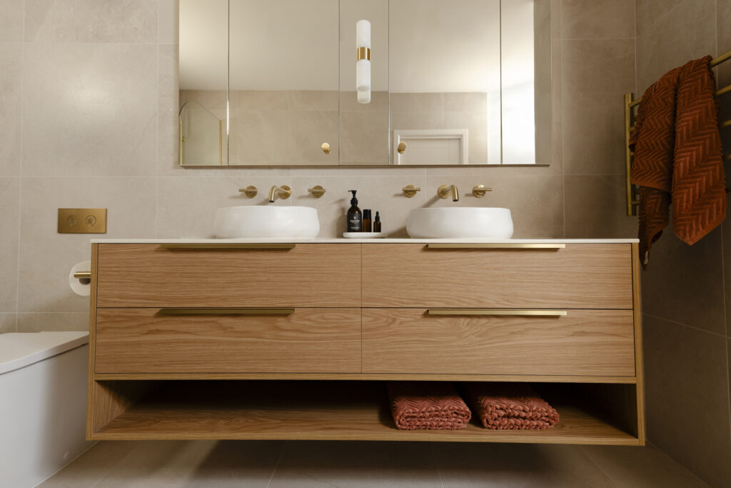 Modern double vanity with brass fixtures